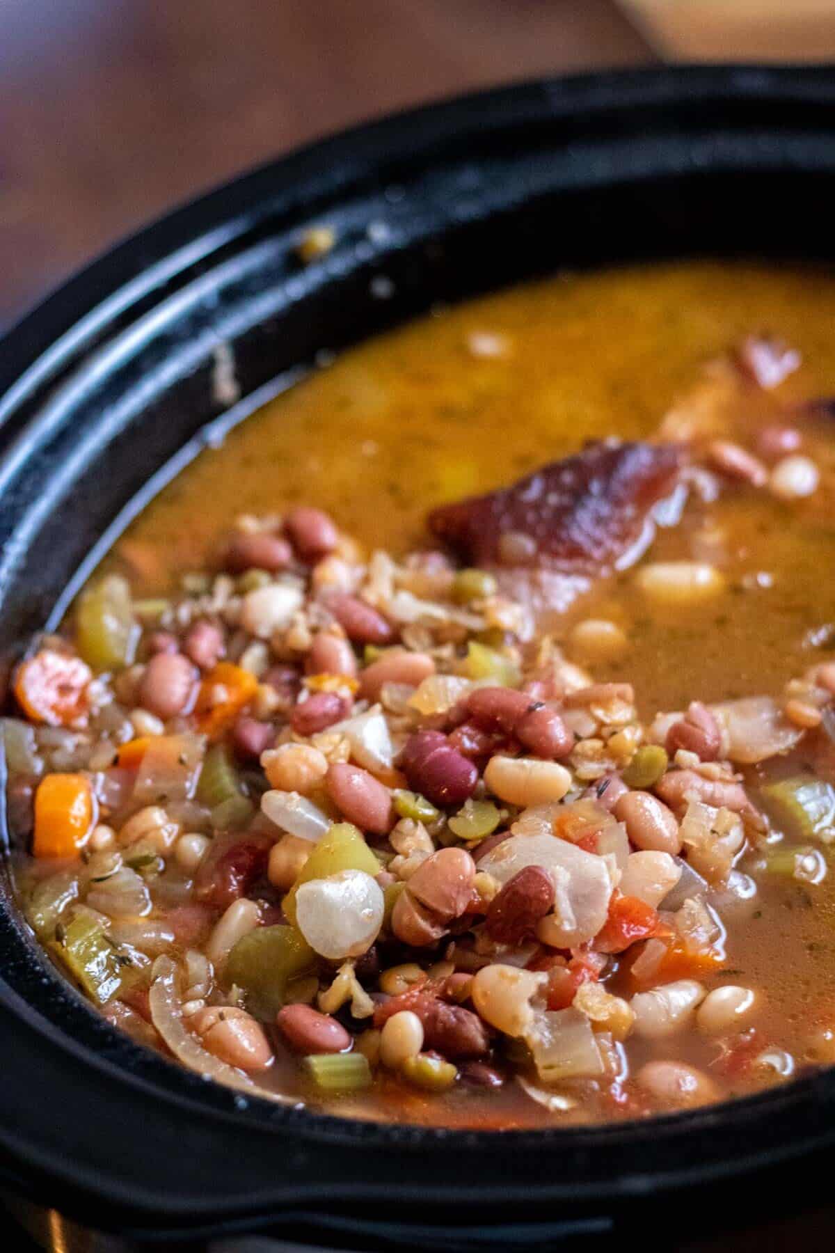 15 bean soup in a black crockpot