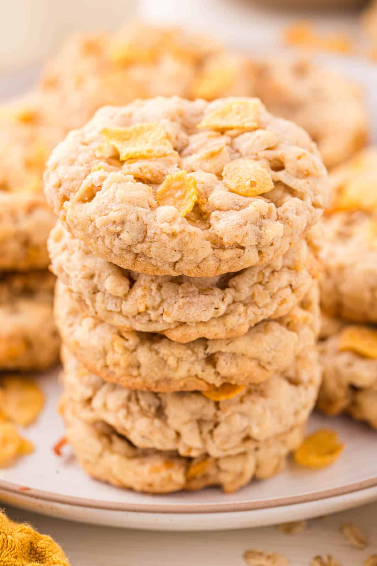 stack of cornflake cookies on a plate.