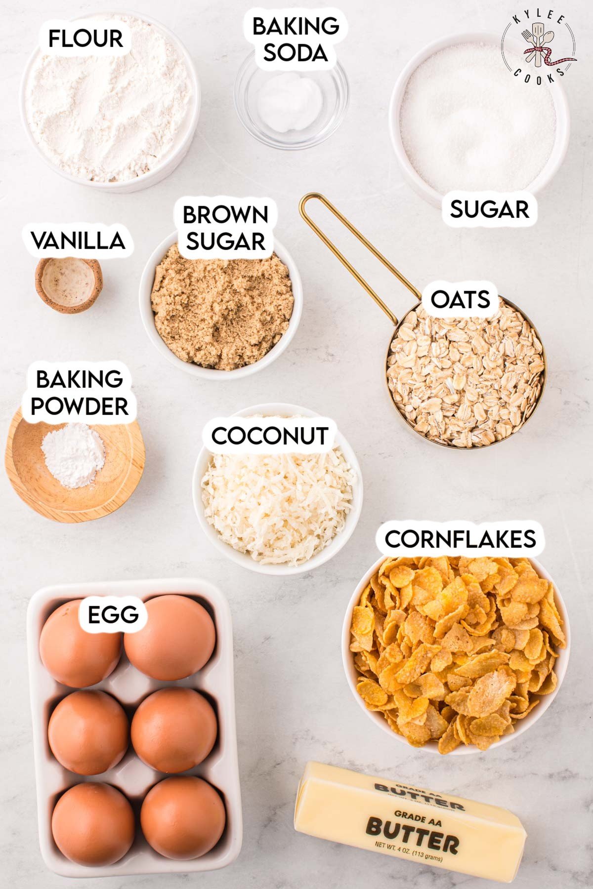 ingredients for cornflake cookies laid out and labeled.