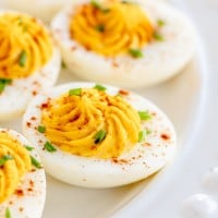 deviled eggs on a white plate