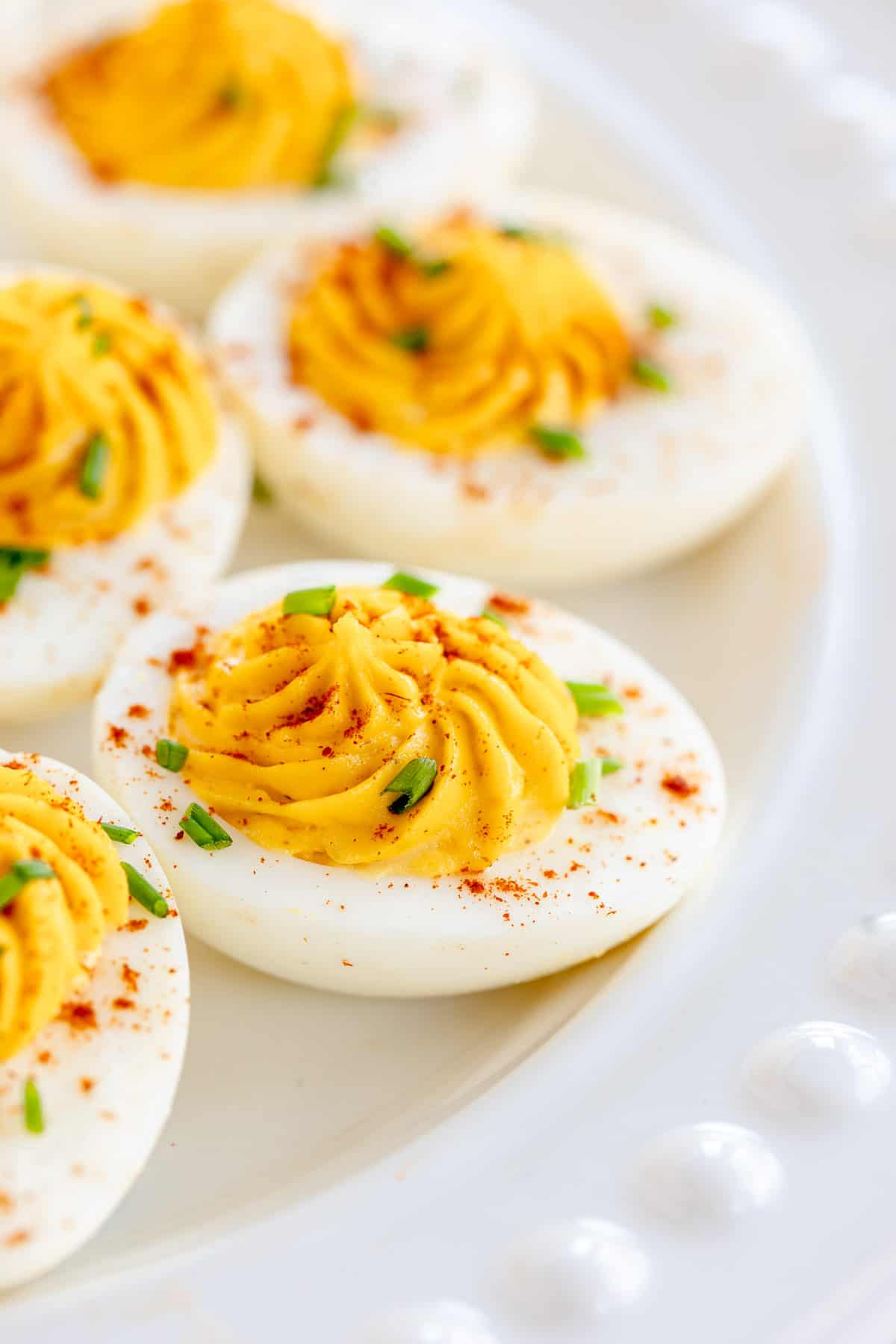 deviled eggs on a white plate