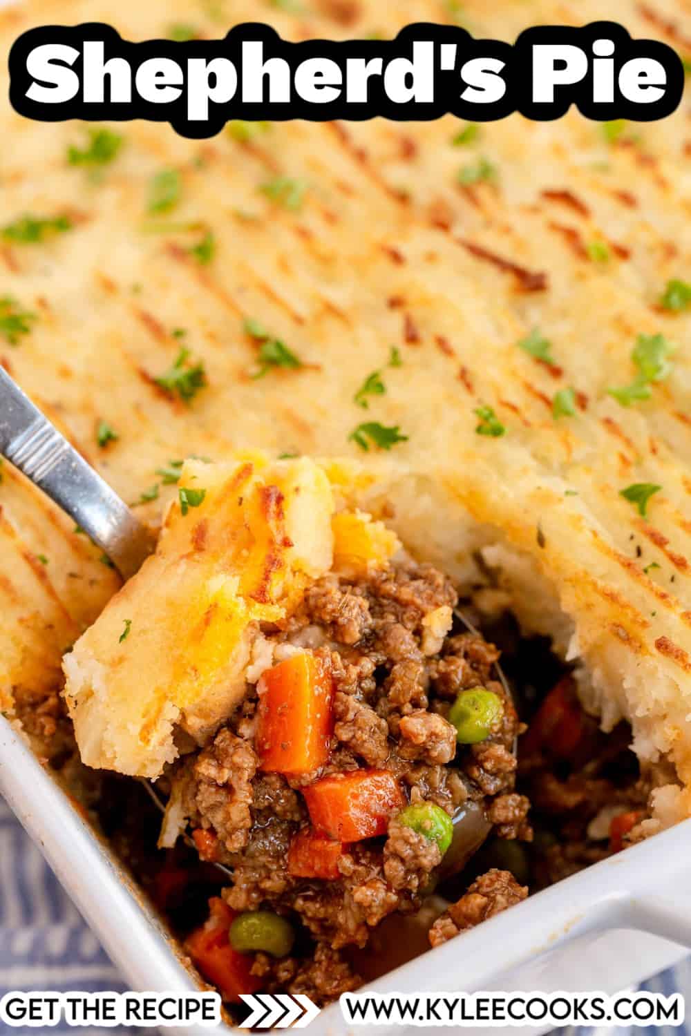 shepherd's pie with a scoop removed showing the inside with recipe title overlaid in text