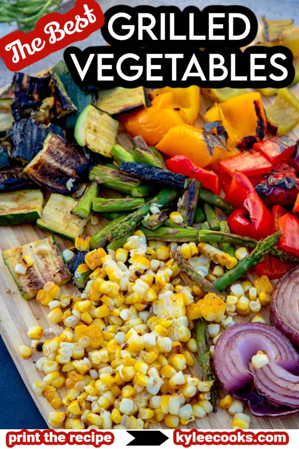 chopped grilled vegetables on a chopping board.