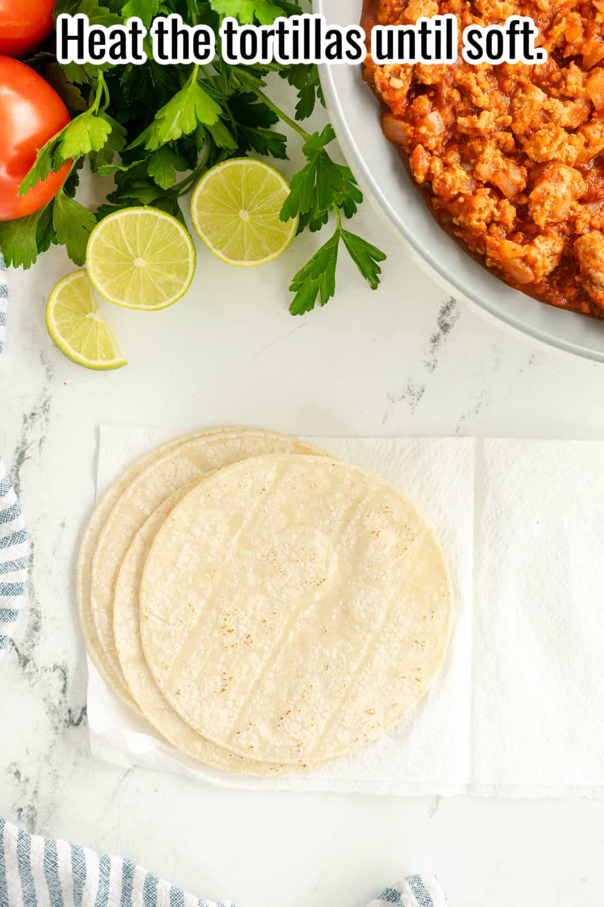 warmed tortillas on a paper towel.