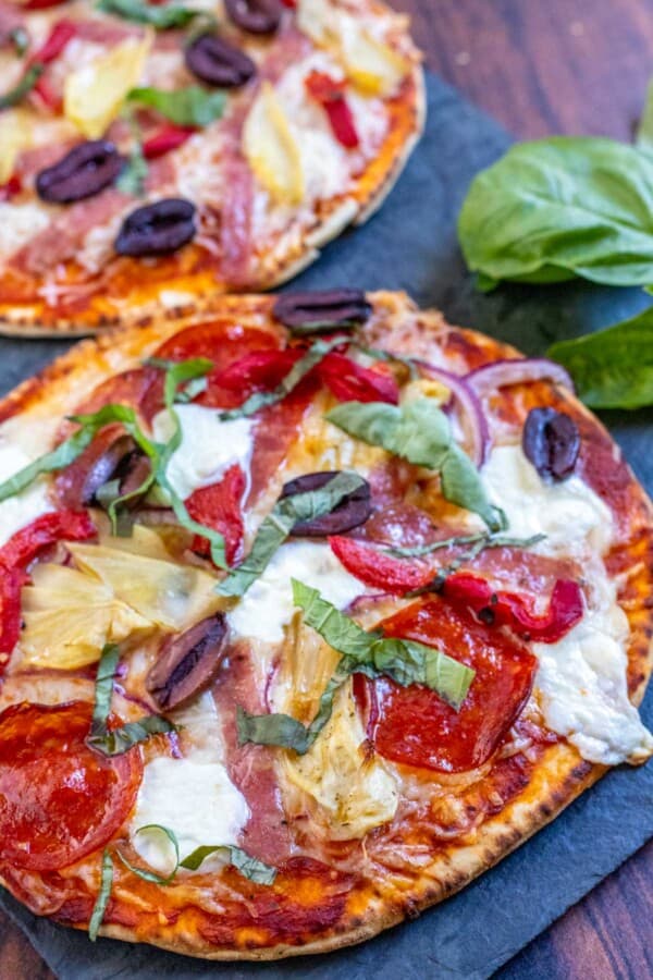 flatbread pizza on a slate board