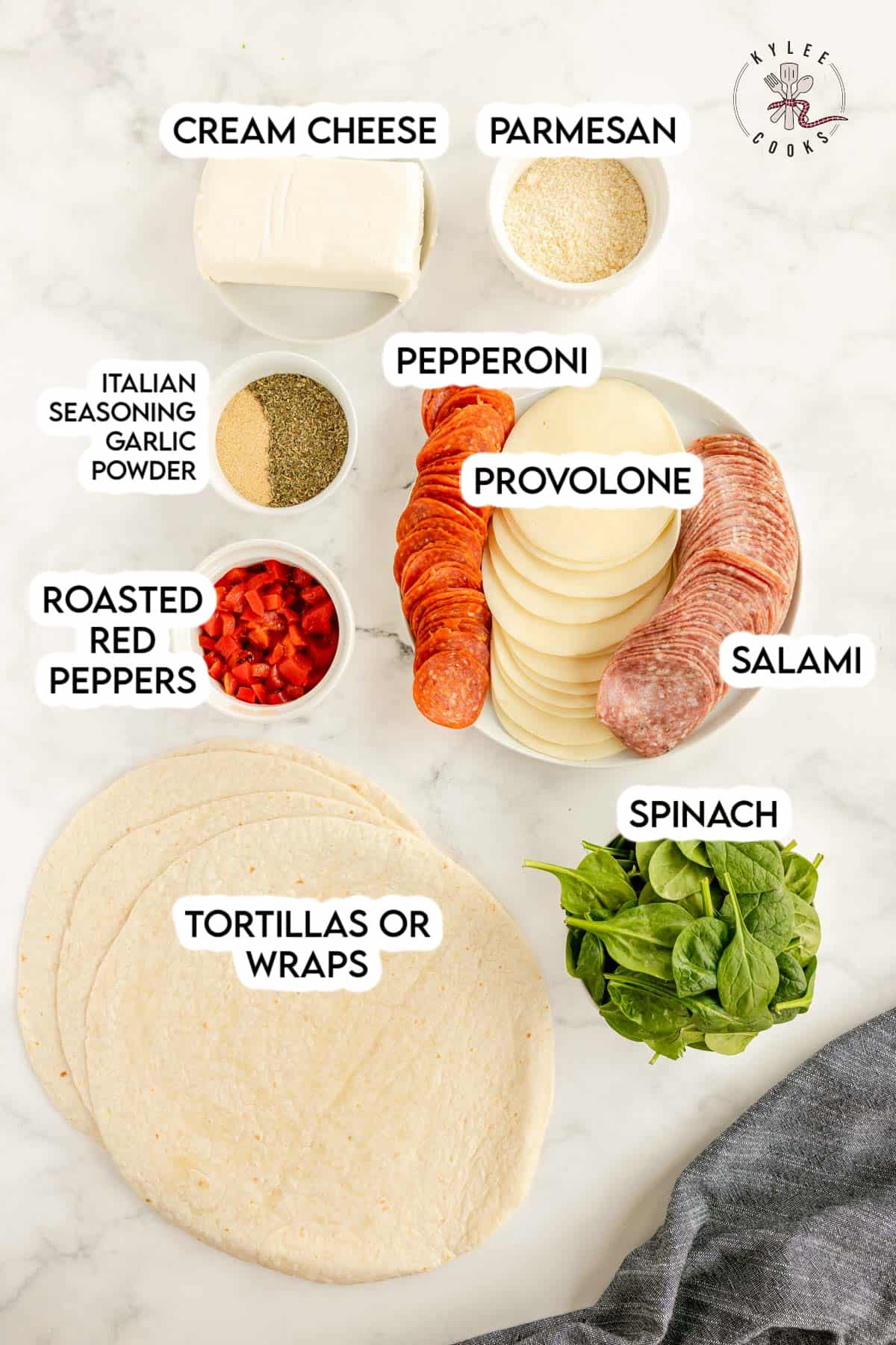 ingredients to make Italian pinwheels laid out and labeled.