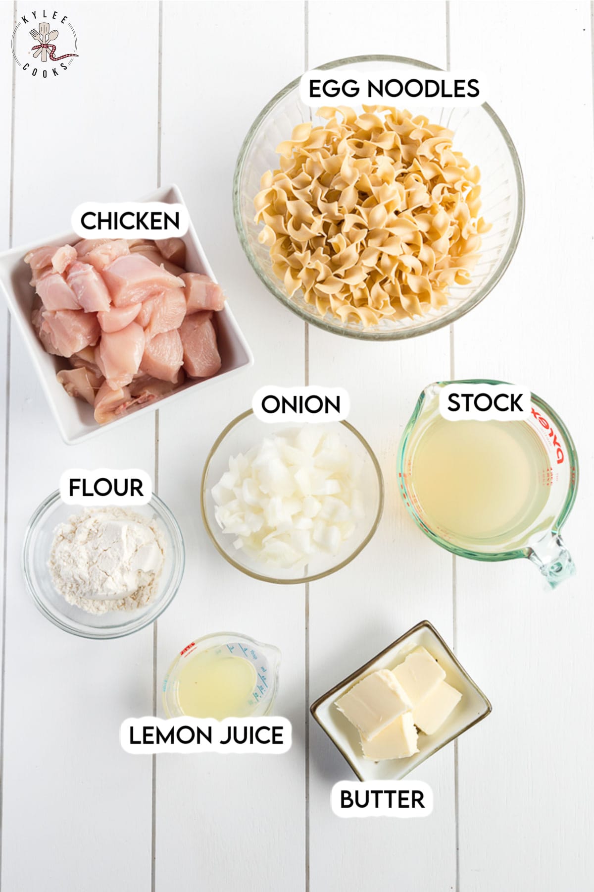 ingredients to make lemon butter chicken laid out and labeled.