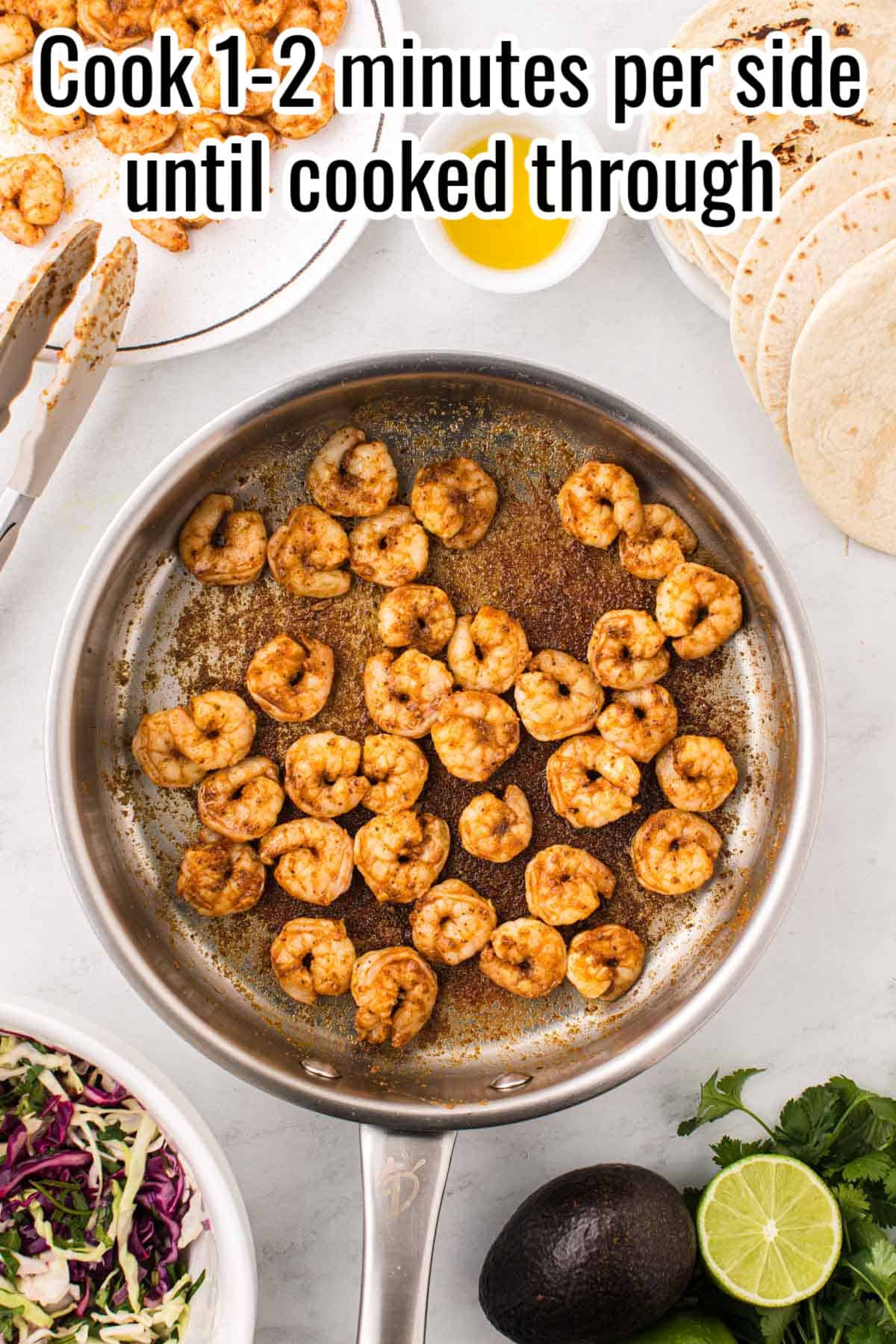 a skillet with cooked baja shrimp.