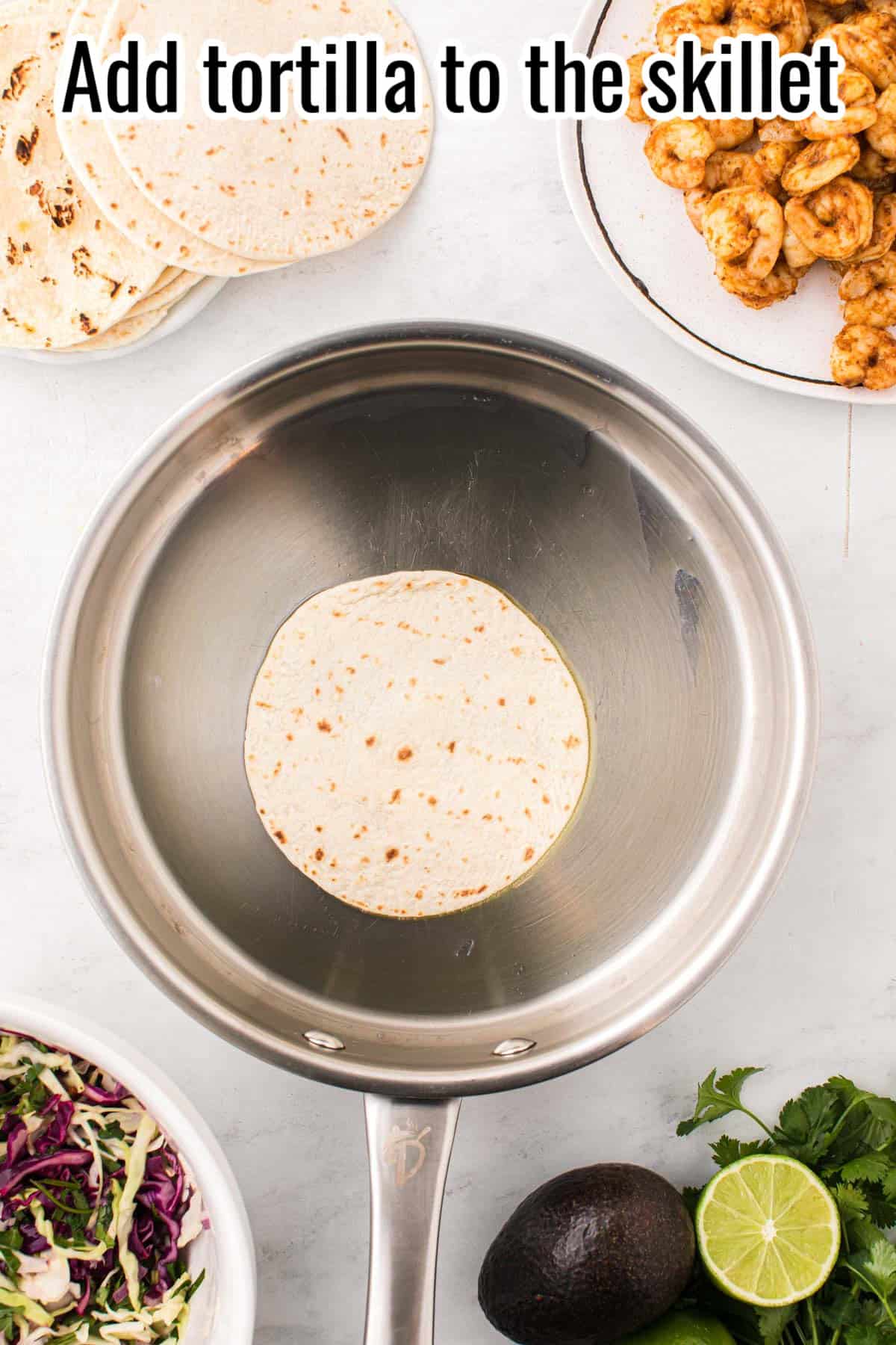 a skillet with one tortilla in it.