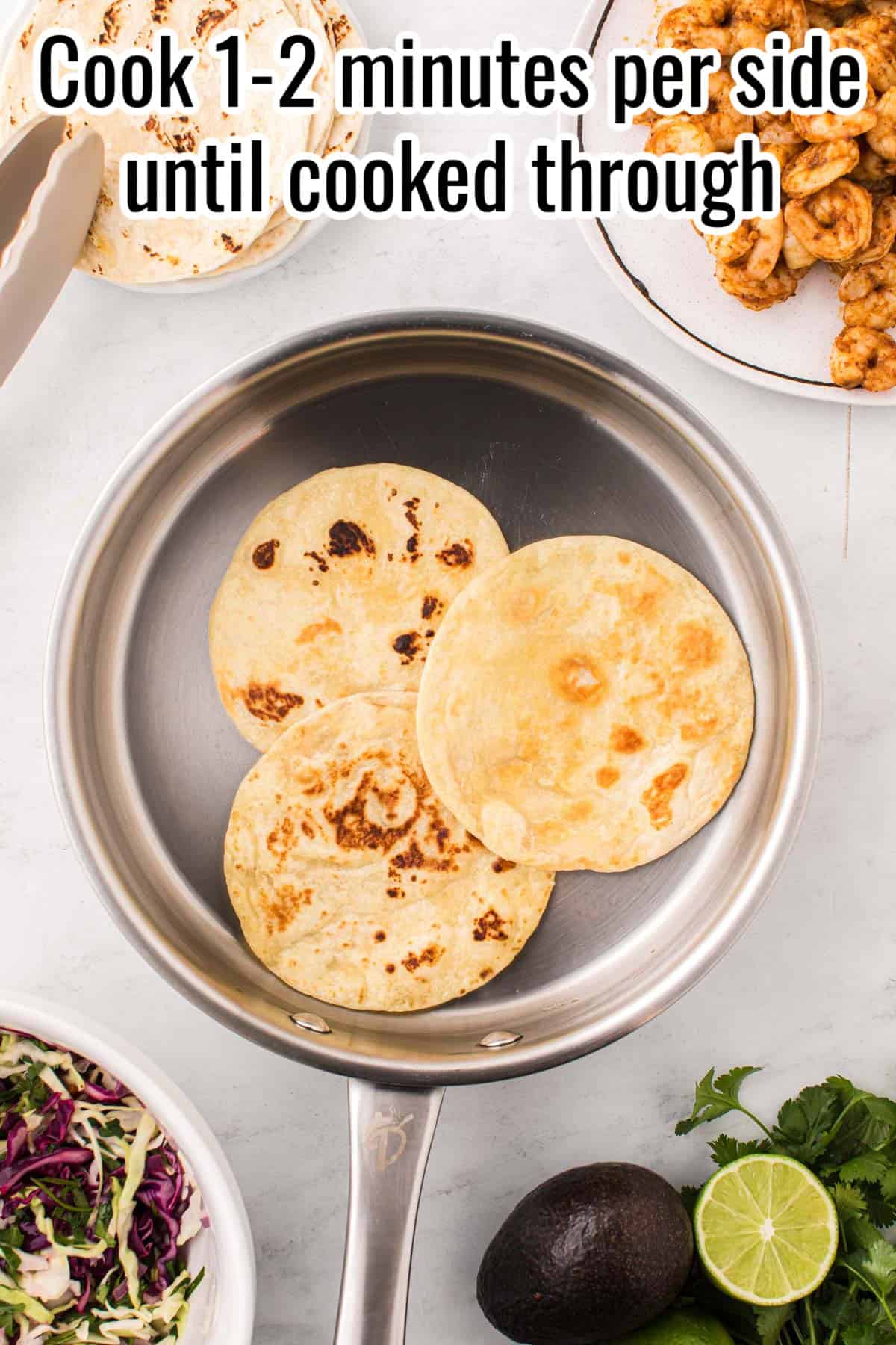 a skillet with 3 tortillas.