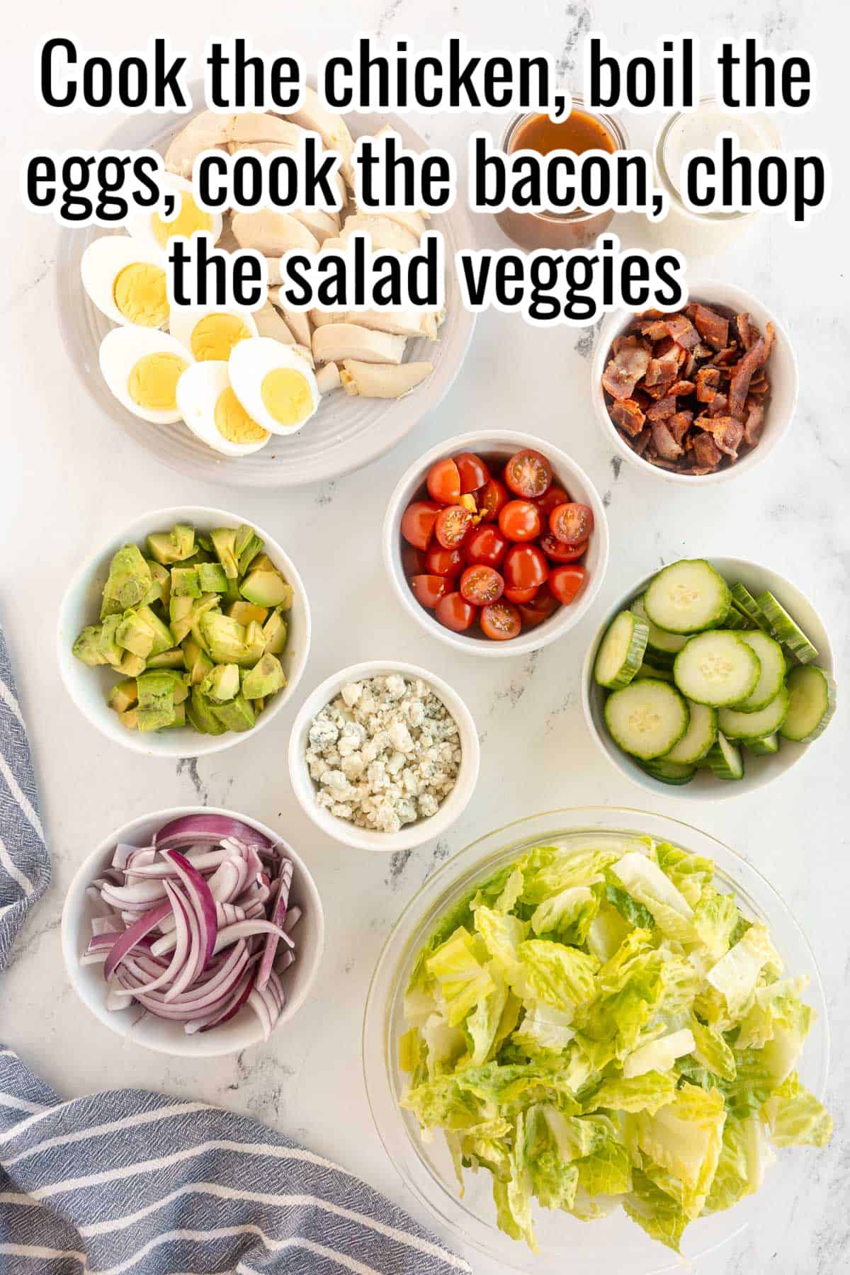 prepped bowls of salad ingredients.