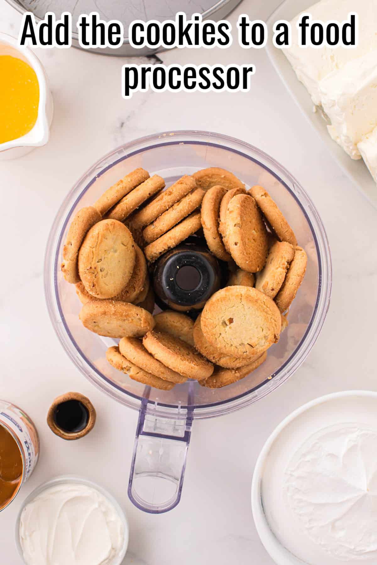 A food processor with whole cookies, before blending.