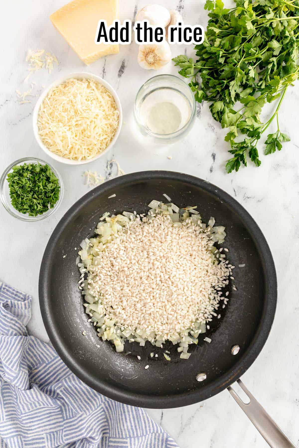 a black skillet with arborio rice.