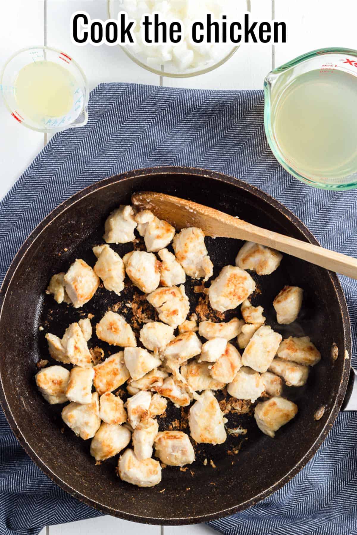 cooked chicken in a black skillet.