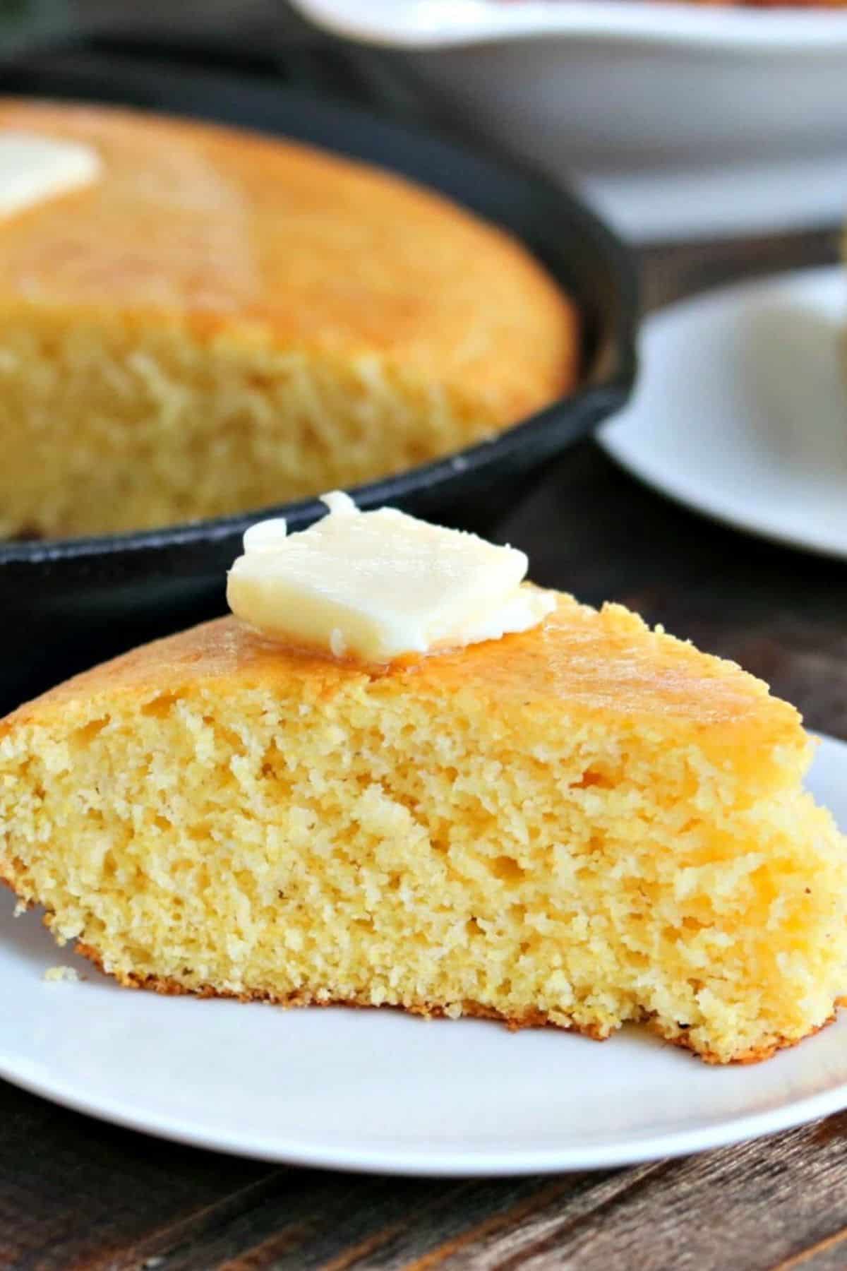 slice of cornbread on a white plate