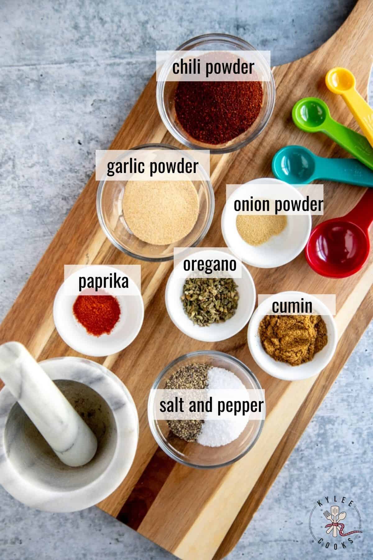 ingredients for taco seasoning laid out and labeled